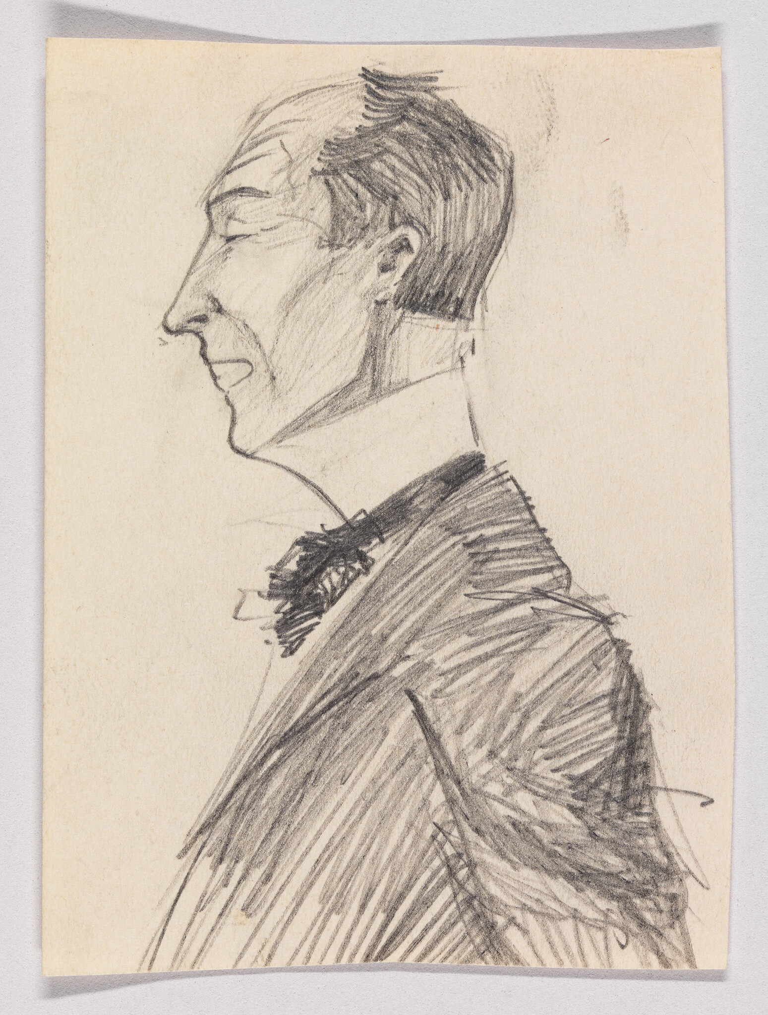 Pencil drawing showing a man's side profile wearing a suit and bow tie.