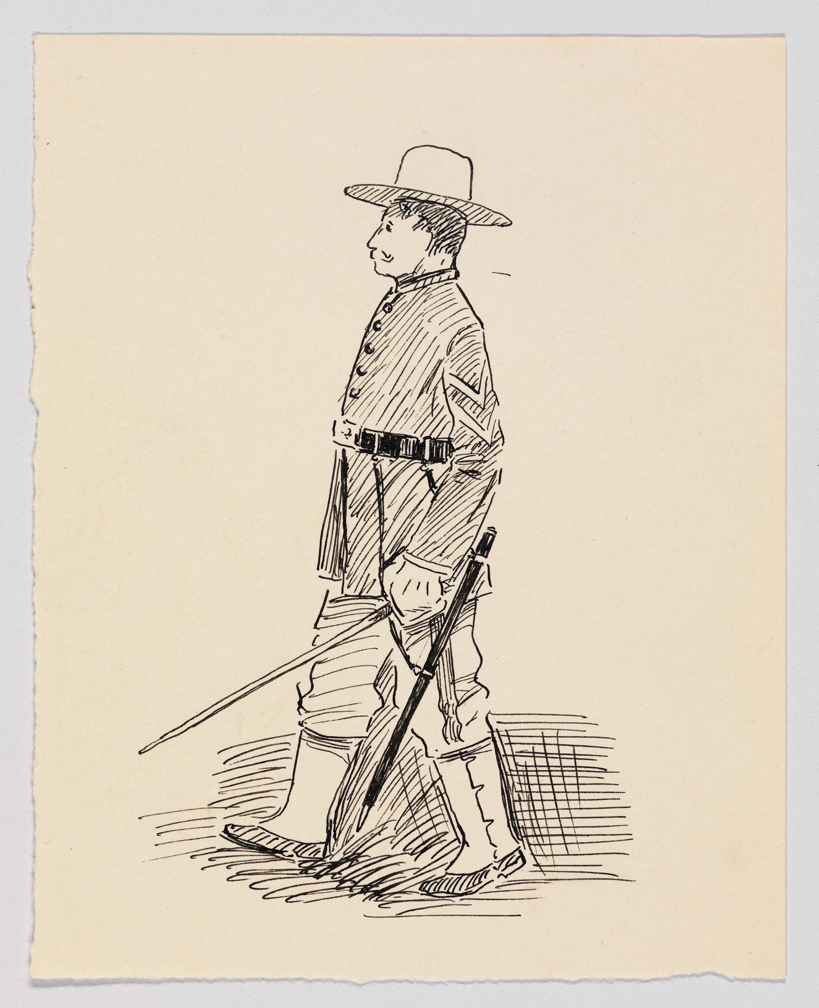 A uniformed soldier wearing a wide-brimmed hat walks while carrying a long rifle.