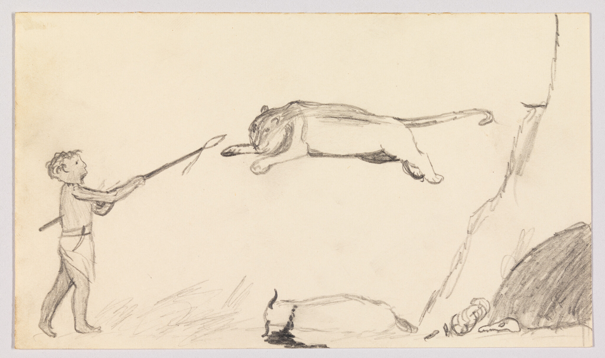 A young hunter thrusts a spear toward a leaping lion suspended from a rocky ledge.