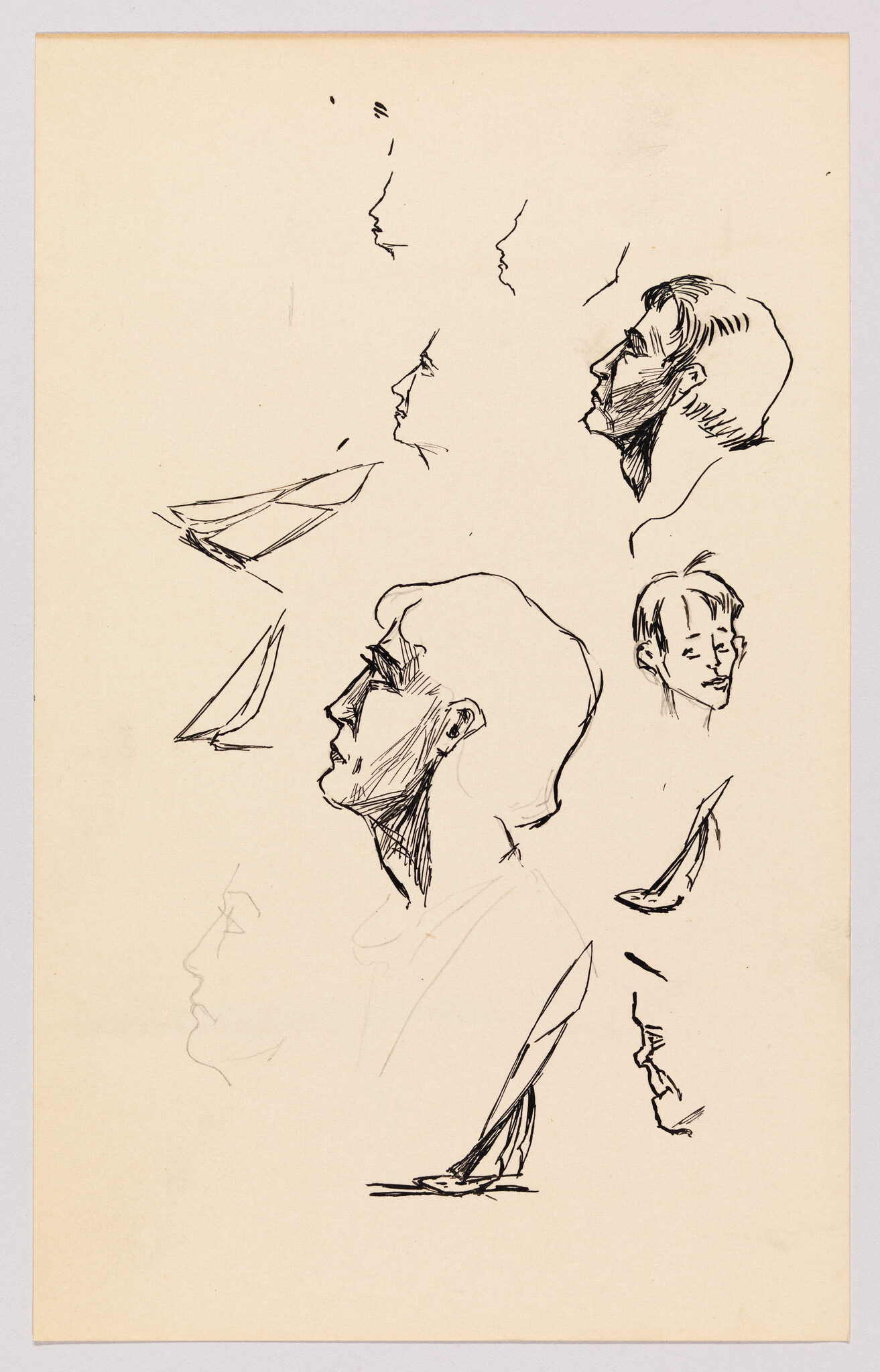 Several ink sketches show profile studies of a man's head and small sailboat drawings on paper.