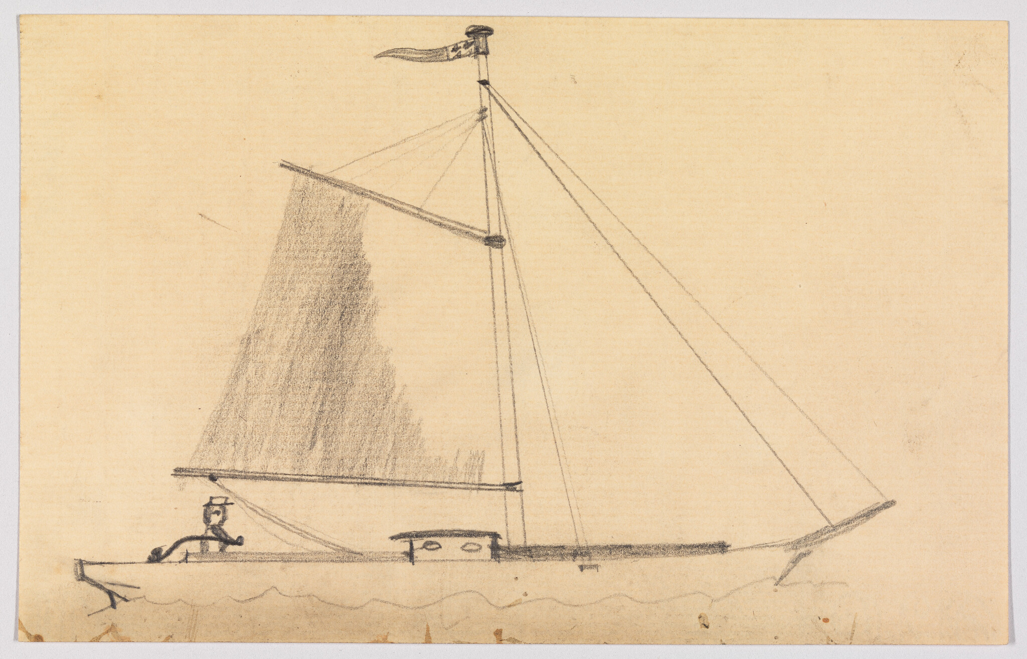 Small sailboat with a person at the stern and a large triangular sail and flag.