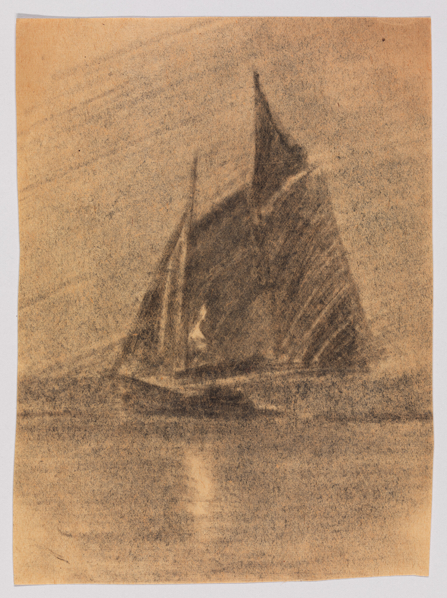 A small sailboat with tall triangular sails glides on calm water, its reflection visible below.