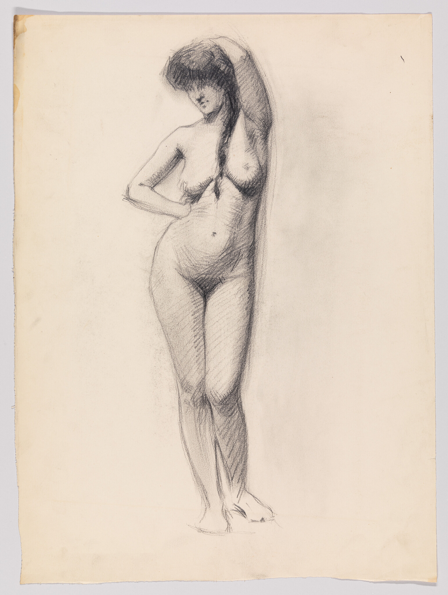 Nude woman stands leaning with one arm raised and long braid falling over her chest.