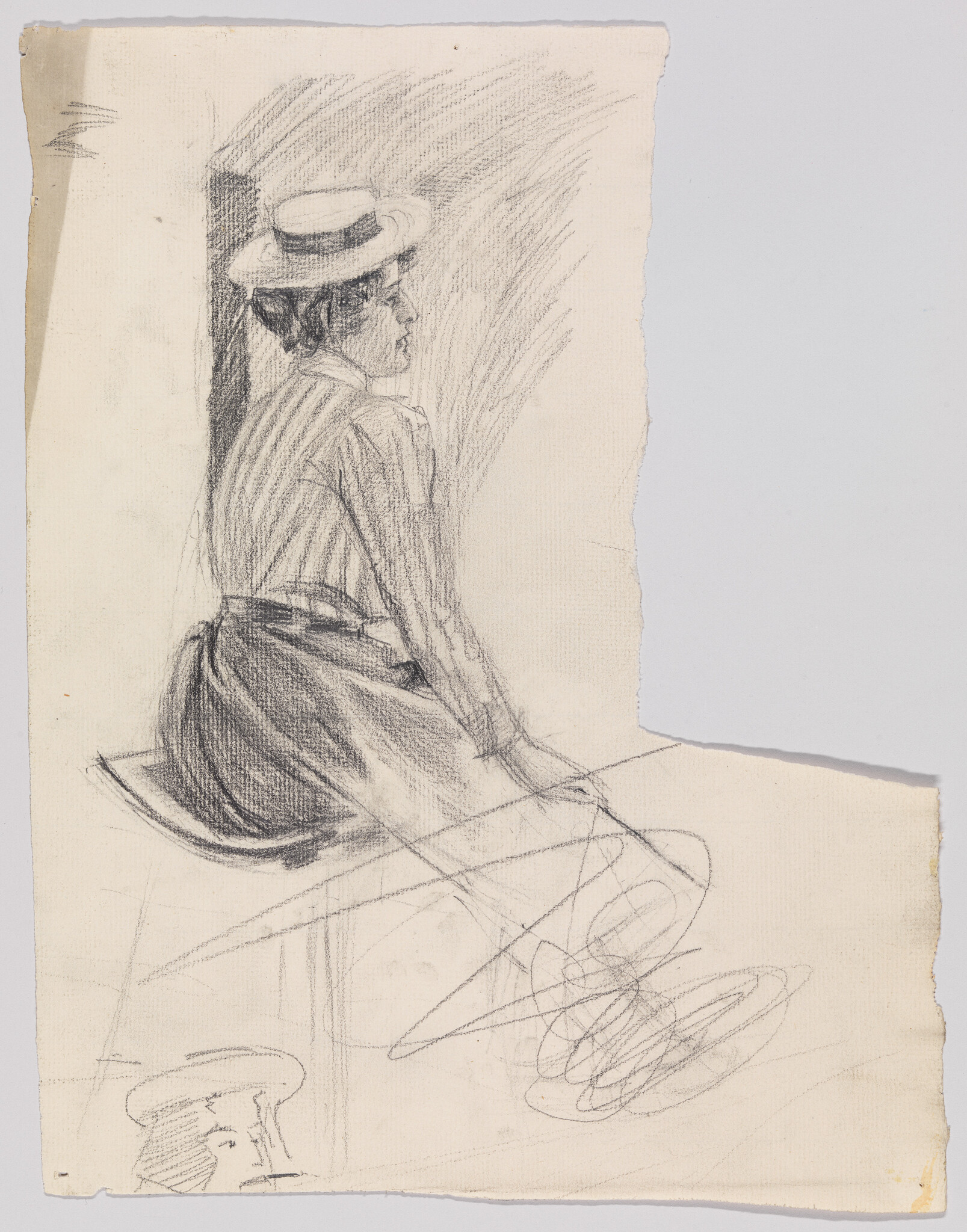 A seated woman in a straw hat and striped blouse looks to the right while sitting on a ledge.