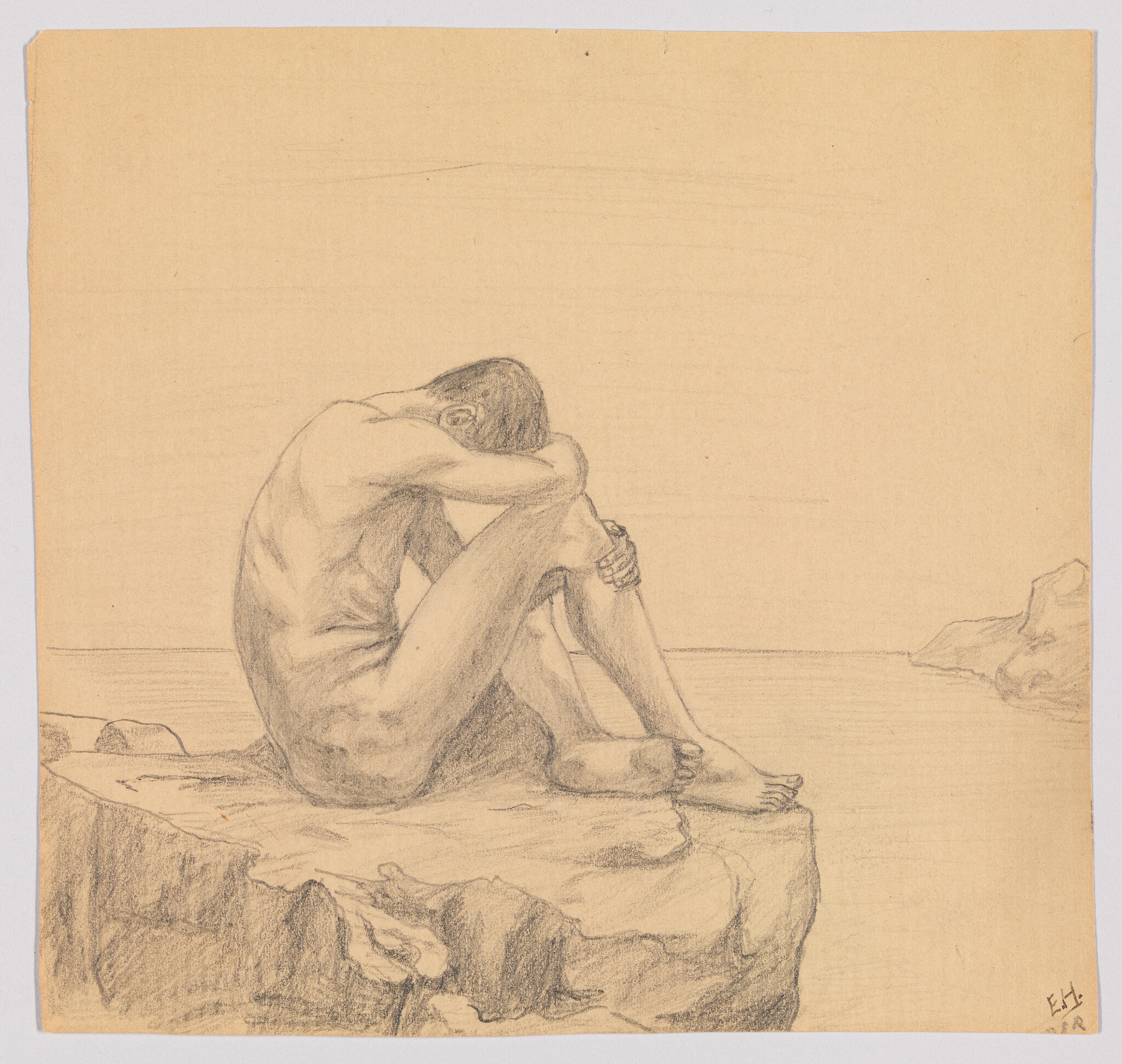 A naked person sits on a rock by the water, hugging their knees and looking down.