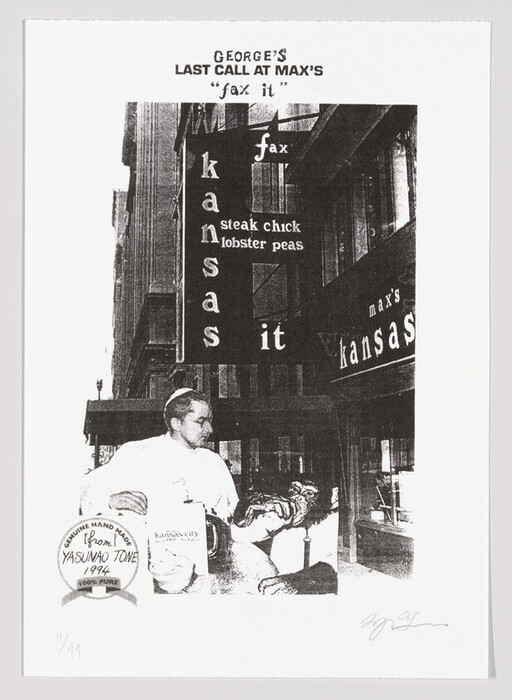Man in a white jacket sitting beneath a downtown storefront sign reading kansas it.