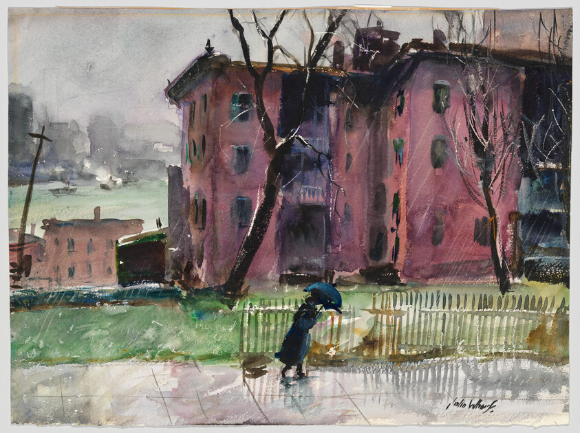 A lone figure walks under a dark umbrella past a pink apartment building in rain.