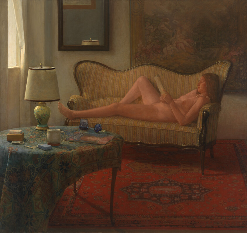 A woman lies nude on a striped couch reading a letter in a sunlit room.