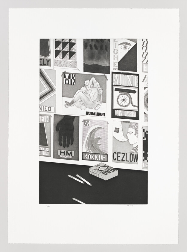 A wall of graphic posters above a table with a cigarette box and three cigarettes.