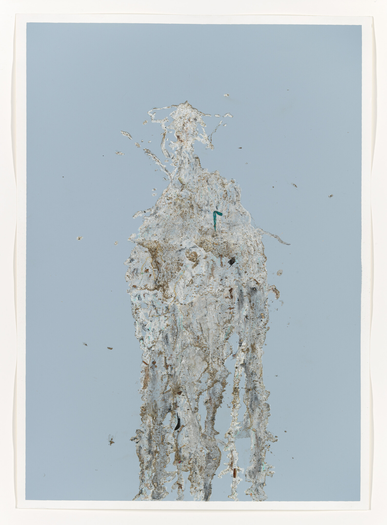 Tall vertical smear of grayish debris and paint drips against a pale blue background.