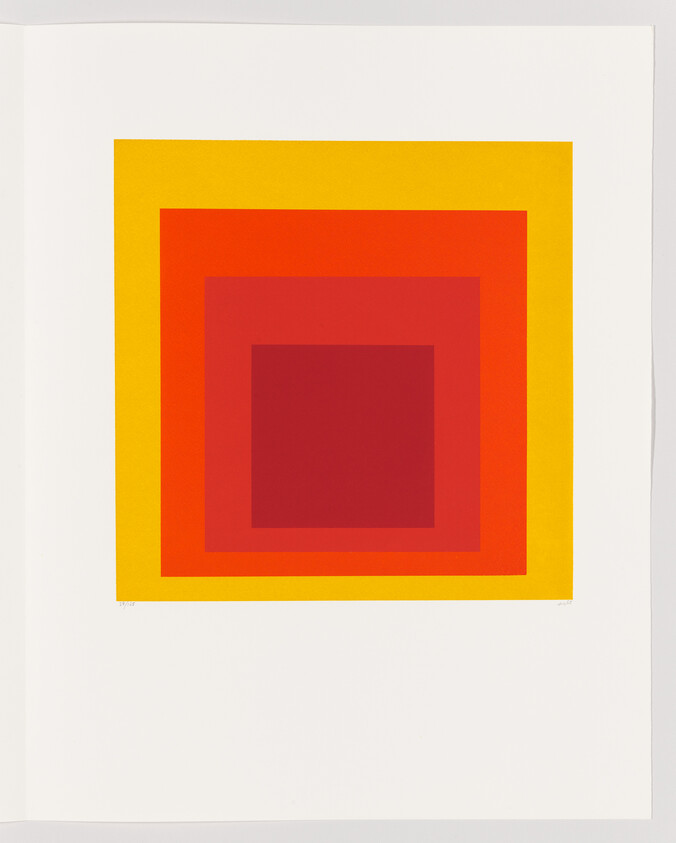 Concentric squares in yellow, orange, and red centered on a white background.