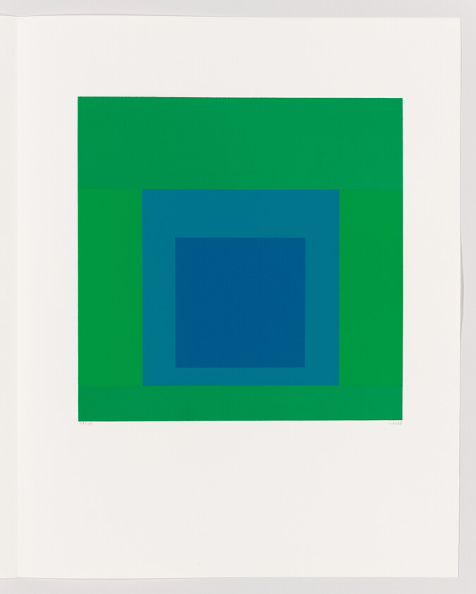 Concentric green and blue square blocks centered on a white background.