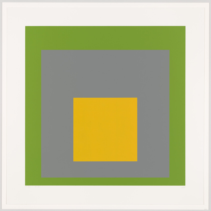 Three nested squares in yellow, gray, and green centered on a white background.