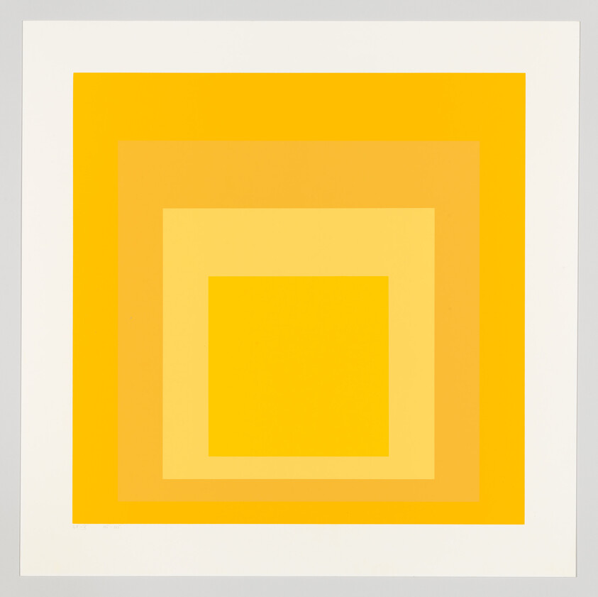Concentric yellow and orange squares form a layered geometric pattern with a white margin.