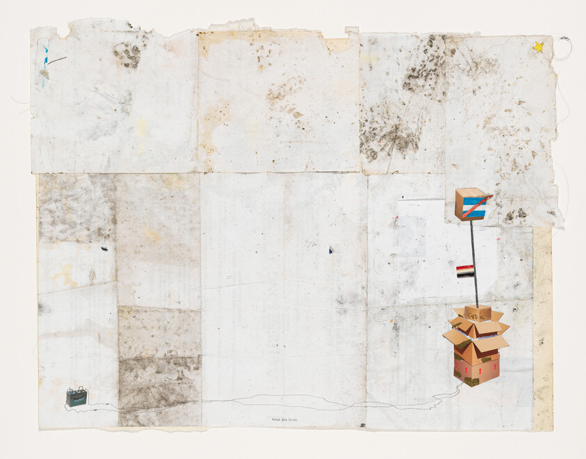 A weathered and stained piece of paper with various small, whimsical drawings and collages, including a tiny ship at the bottom left, a stack of boxes labeled "Fragile" in the center, and a colorful abstract shape on a pole to the right. The paper has visible folds, creases, and tears, suggesting age and wear.