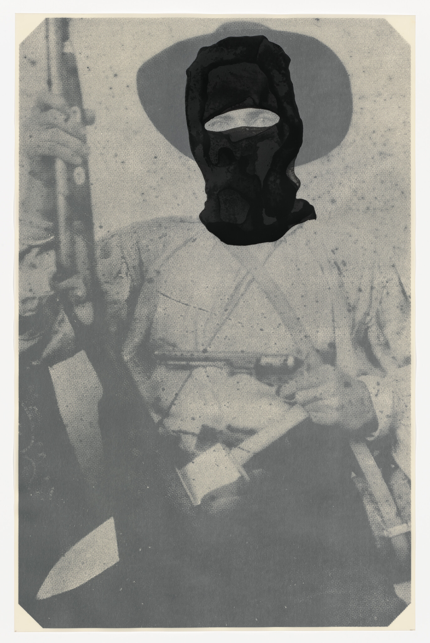 A masked person wearing a hat holds a rifle in one hand and a pistol in the other.