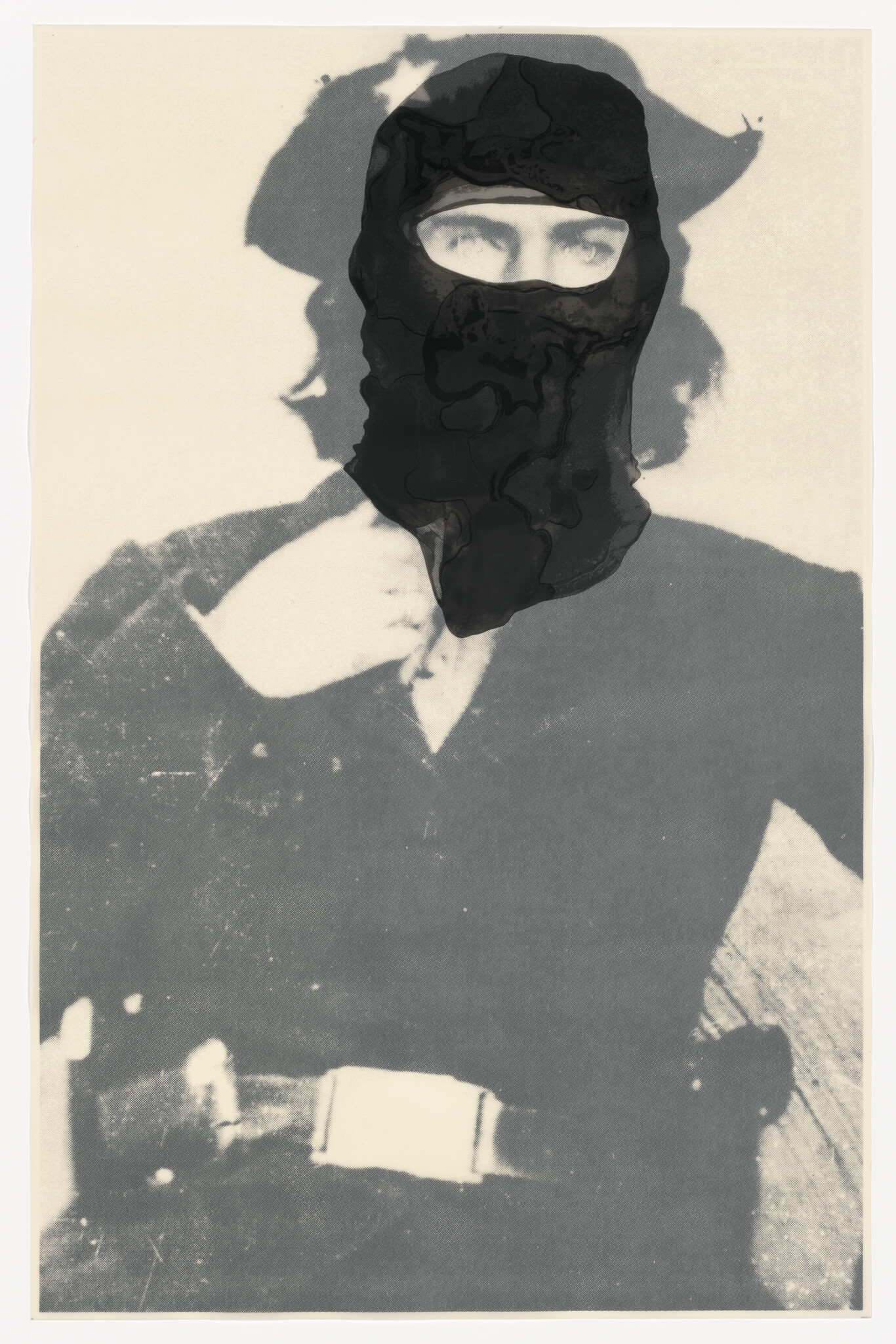 Person wearing a black balaclava over an old-fashioned portrait, eyes visible through the opening.