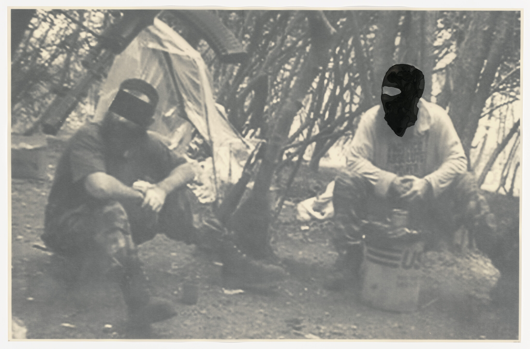 Two people wearing balaclavas sit by a makeshift tent in a wooded campsite.