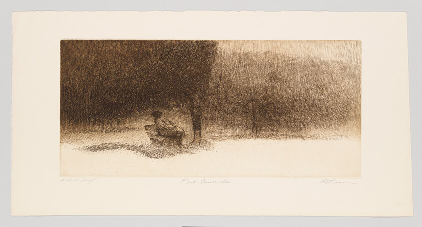 A person sits on a bench under dim light while two figures stand in the shadowy background.