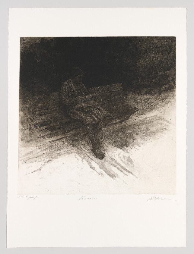 A solitary person sits on a bench in shadow, wrapped in a heavy coat.