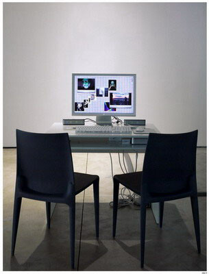 Two black chairs face a desk with a computer displaying several open windows and images on the screen.