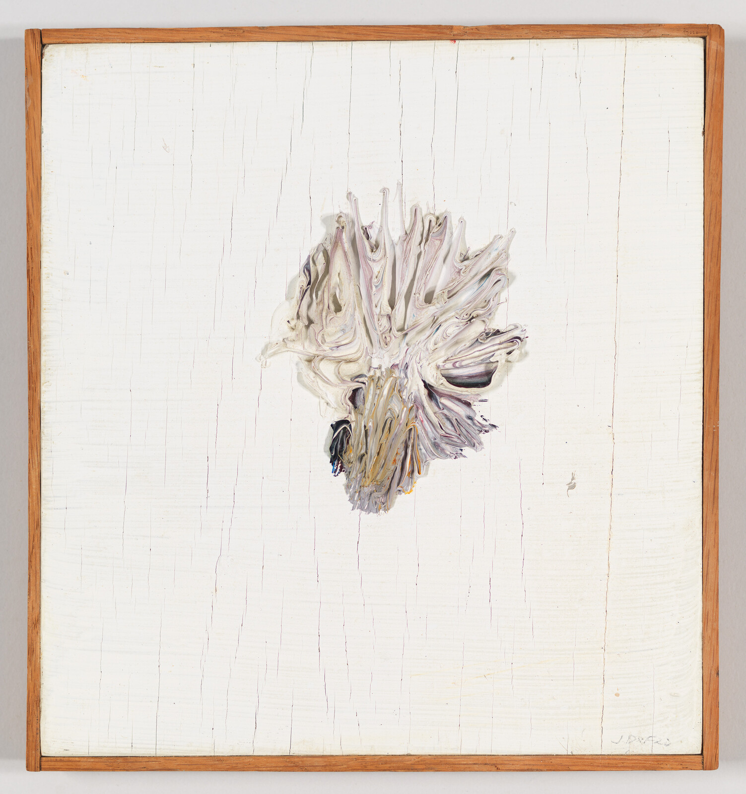 Thick swirling cream and gray paint forms a textured flower-like cluster on a white cracked canvas.