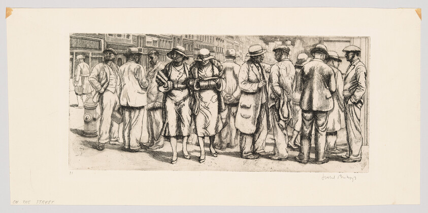 A crowd of men and two women in coats and hats standing and talking on a city street.