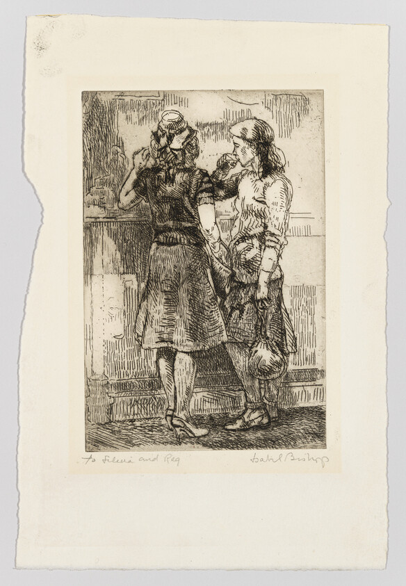 Two young women stand at a counter, one sipping from a glass while they talk.