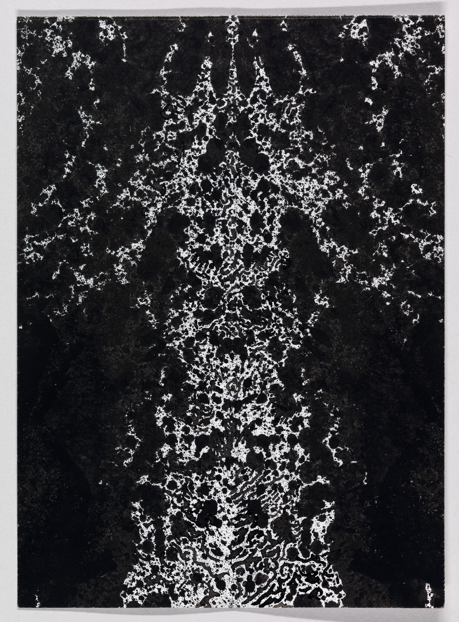 Vertical column of white speckled texture runs down a black rectangular surface like peeling paint.