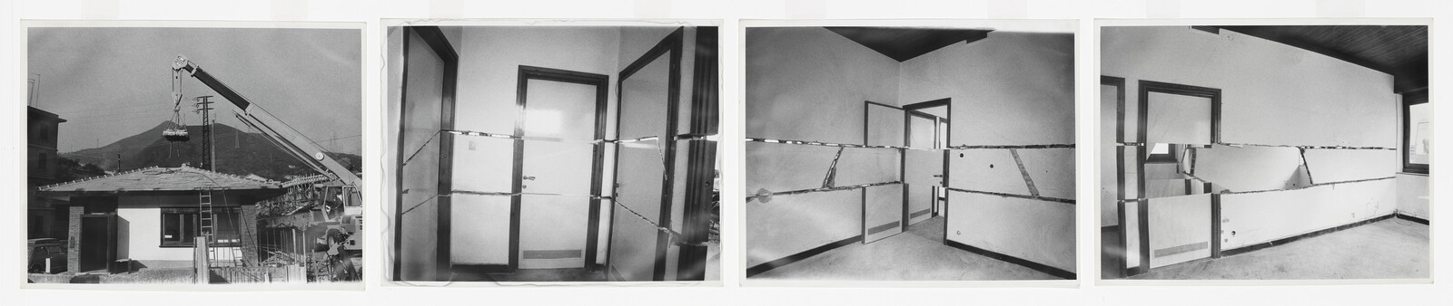 Workers use a crane to remove the roof while interior walls are cut and dismantled.