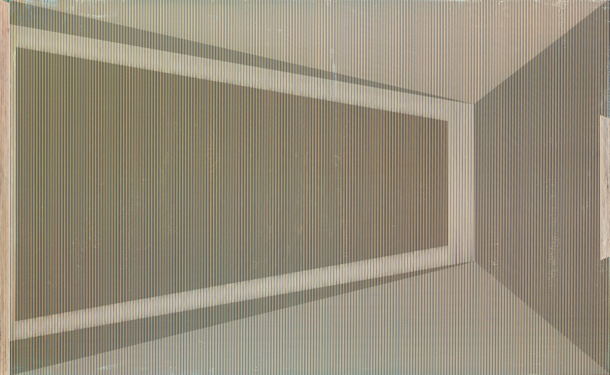 A corner with vertical striped blinds creating strong diagonal light and shadow patterns.