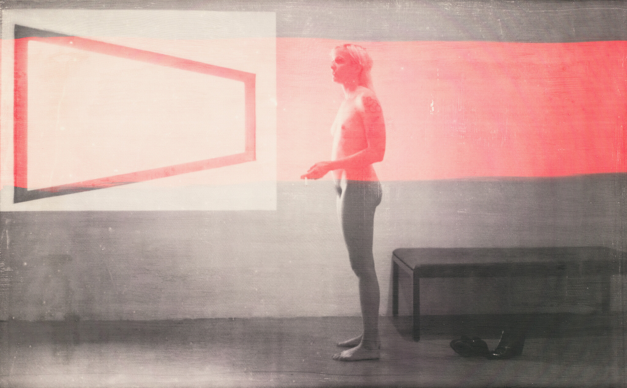 A nude person stands facing a glowing geometric projection with a red horizontal stripe.