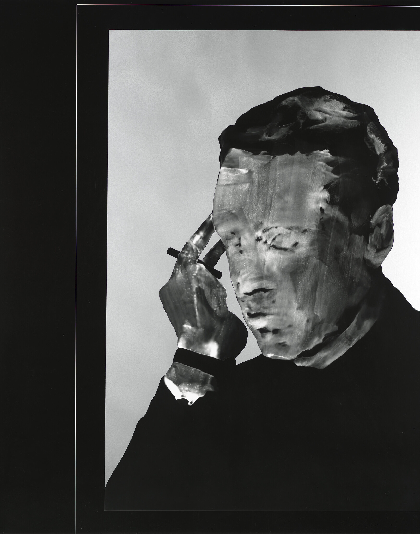 A black and white artistic photograph of a person with a distorted face holding a cigarette between their fingers, set against a plain background. The image has a surreal quality due to the manipulation of the facial features.