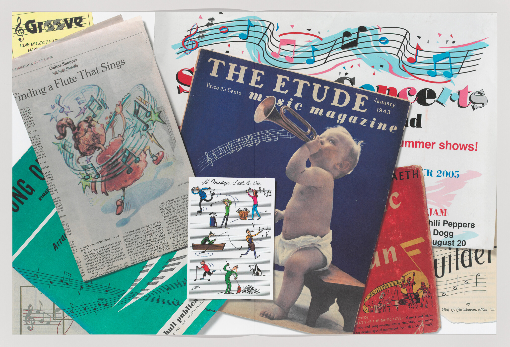 A baby blowing a trumpet on the cover of The Etude music magazine among other music clippings.