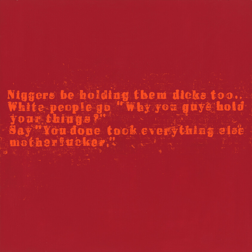 Red background with stenciled orange text quoting a racist slur and profanity.