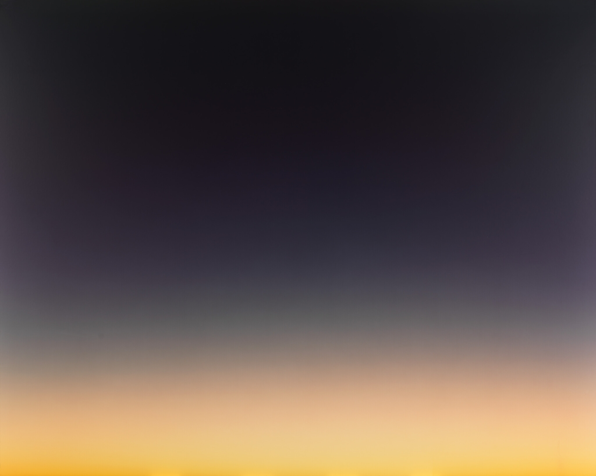 A smooth gradient sky transitioning from deep twilight to warm golden sunrise near the horizon.