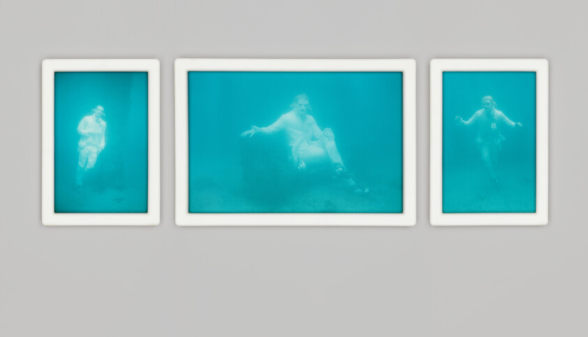 Three framed images show a person underwater, sitting and standing in different poses.