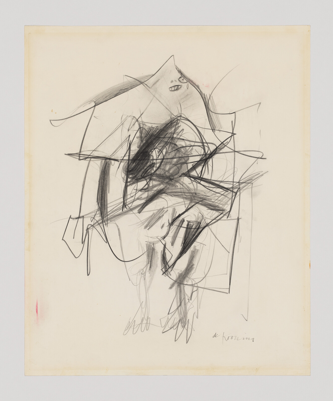 Chaotic charcoal sketch of a hunched human figure surrounded by overlapping angular lines.
