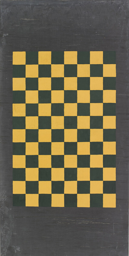 Rectangular checkerboard of alternating yellow and dark green squares centered on a worn gray background.