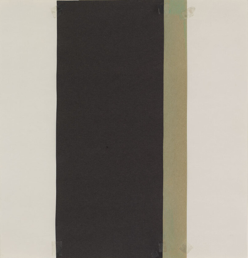 A tall black rectangle centered on a beige background with a narrow faded green strip at the right.