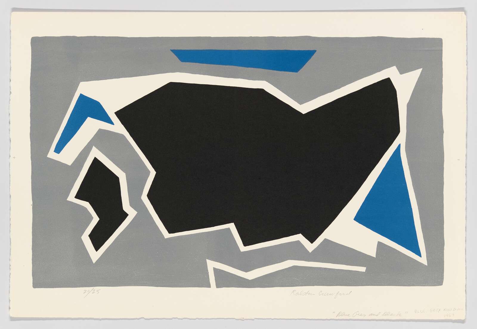 A large irregular black shape with white and gray border and blue triangular accents.