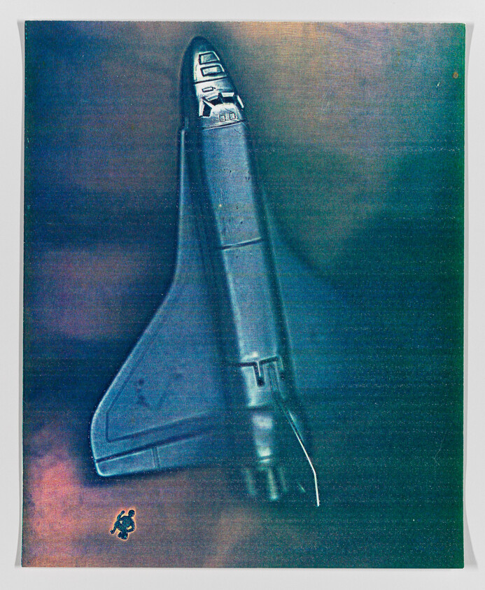 A stylized artistic representation of a space shuttle during descent with a small figure parachuting nearby.