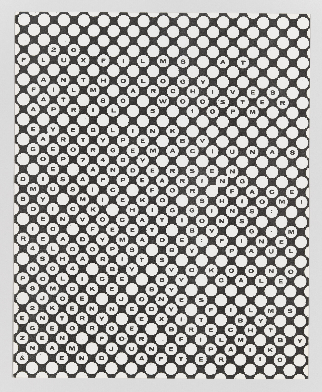 Black and white optical illusion with hidden words among patterns of circles.