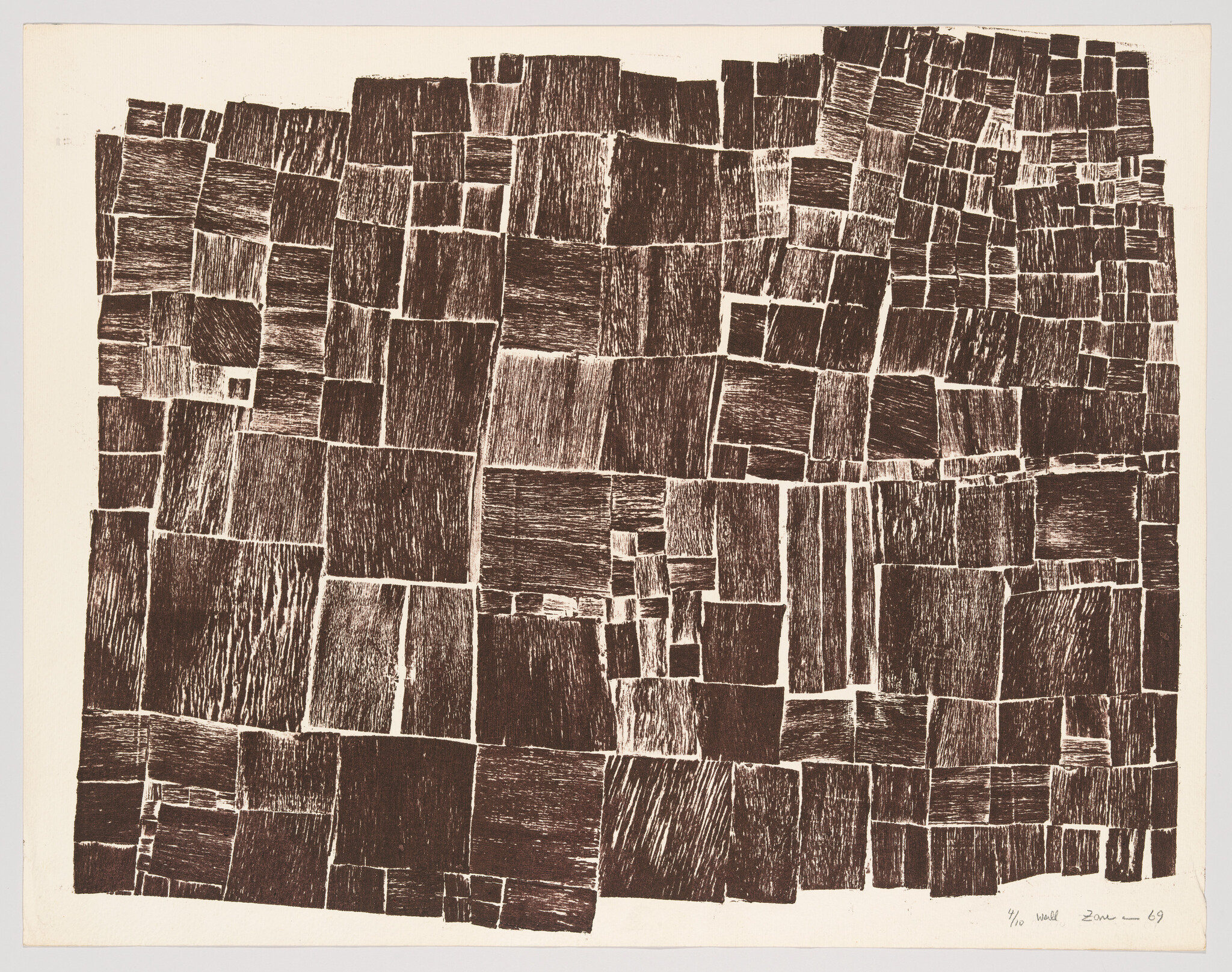 Abstract grid of irregular textured brown rectangles forming a patchwork pattern.