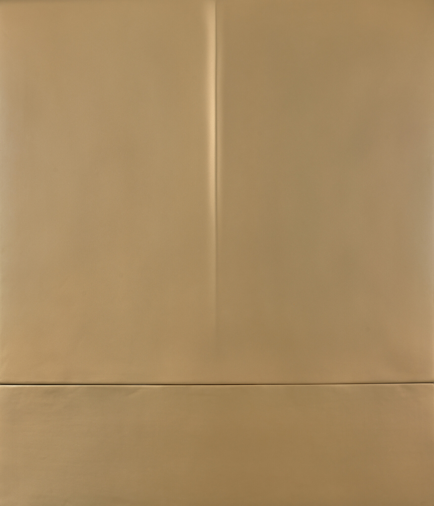 Beige padded wall panels with a horizontal seam near the bottom and a vertical crease.