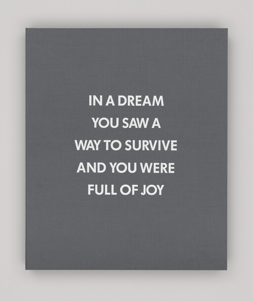 Gray poster with centered white text quoting a dream about finding a way to survive and feeling joy.
