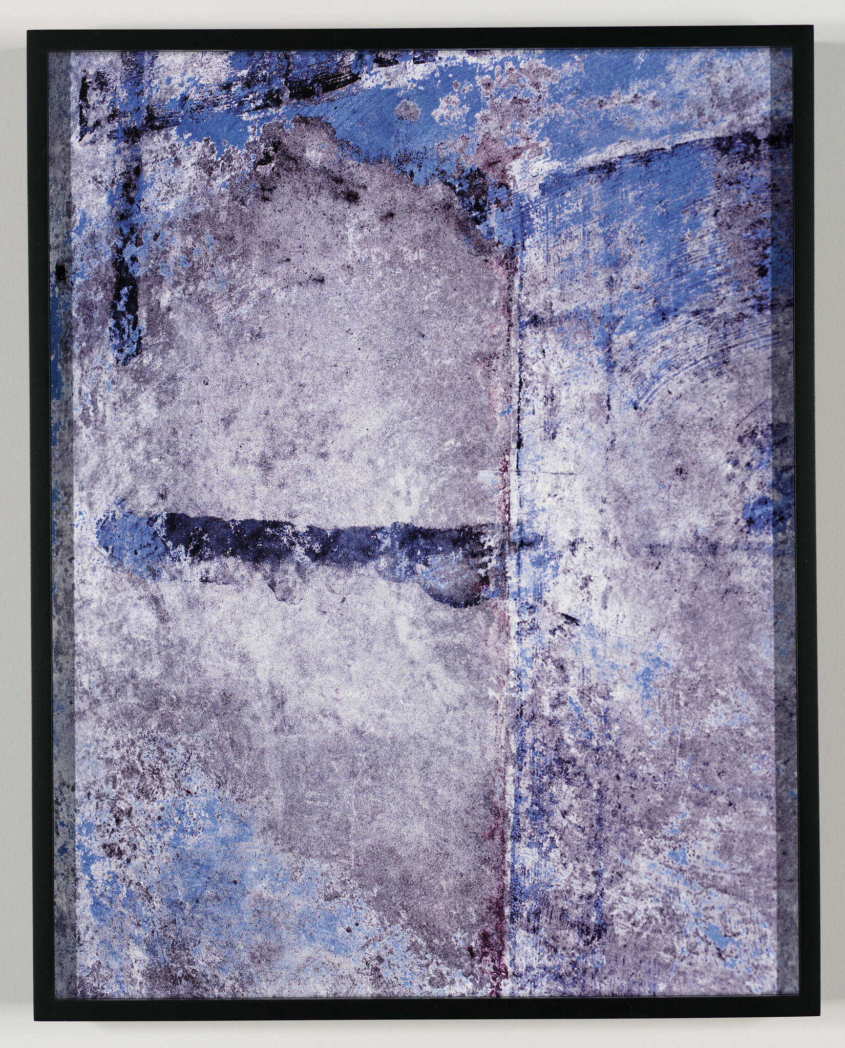 Abstract framed artwork showing textured blue and gray paint with vertical and horizontal markings.
