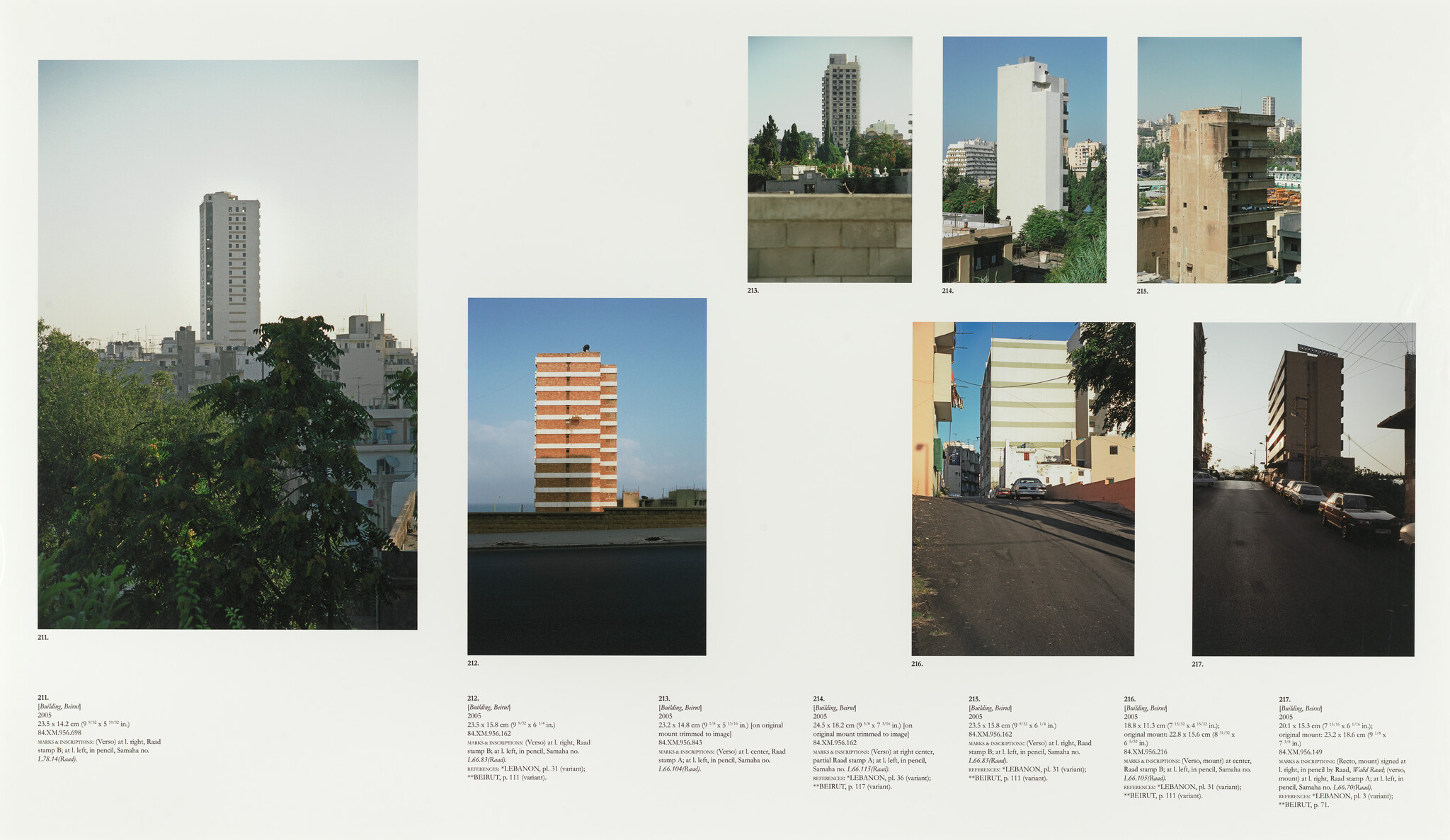 Multiple photographs of tall apartment buildings and city streets arranged on a white gallery page.