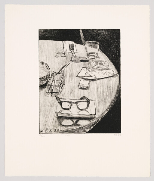 A round wooden table holds two pairs of eyeglasses, a glass, an ashtray, coins, and papers.