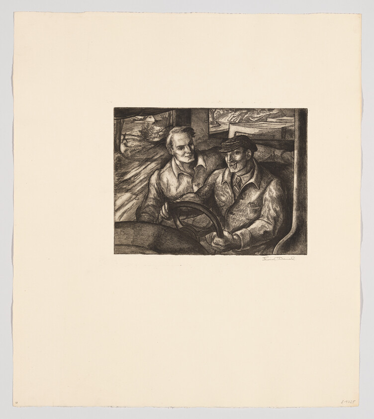 Two men sit in a truck, the driver holding the wheel while the passenger smiles.